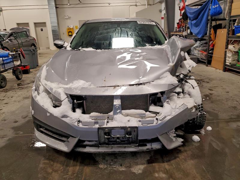 Photo 5 from auction – 2018 HONDA CIVIC LX with VIN 2HGFC2F59JH007219