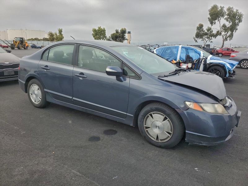 Photo 4 from auction – 2006 HONDA CIVIC HYBR with VIN JHMFA36276S028780