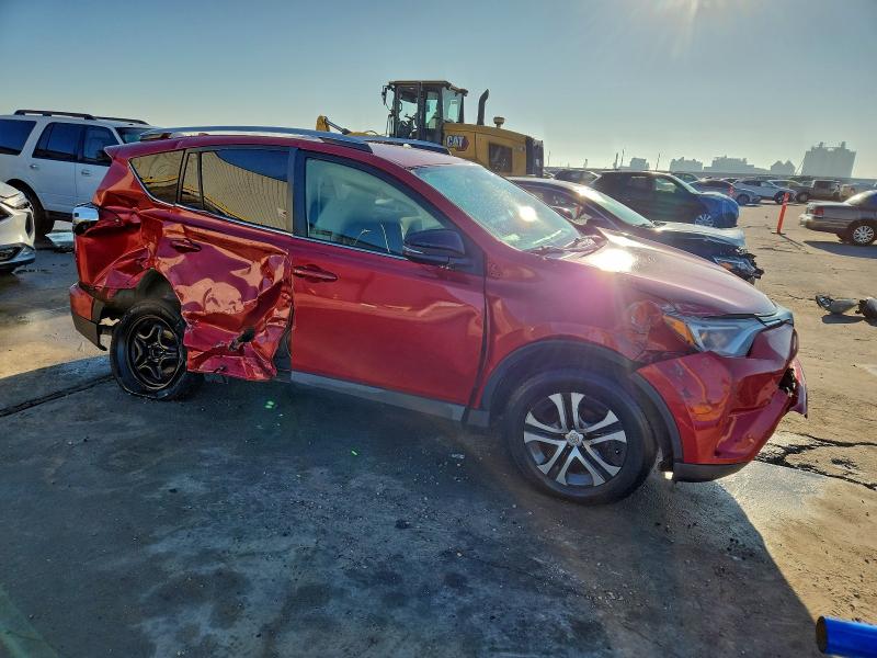 Photo 4 from auction – 2016 TOYOTA RAV4 LE with VIN JTMZFREV5GJ062433