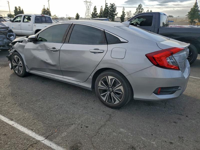 Photo 2 from auction – 2016 HONDA CIVIC EX with VIN 2HGFC1F35GH642195