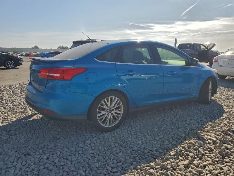 Photo 3 from auction – 2015 FORD FOCUS TITA with VIN 1FADP3J25FL229611