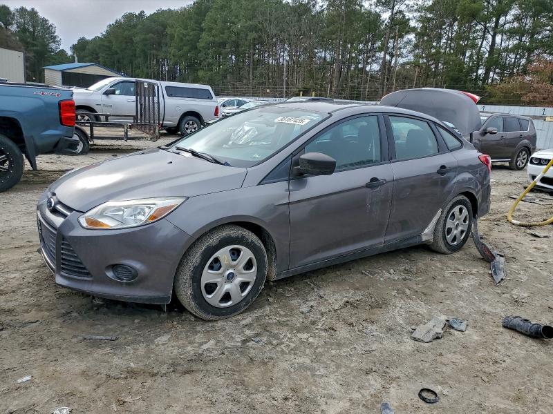 FORD FOCUS S 2013 with VIN 1FADP3E20DL370979 - Photo from auction