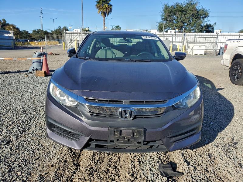 Photo 5 from auction – 2018 HONDA CIVIC LX with VIN 2HGFC2E57JH582291