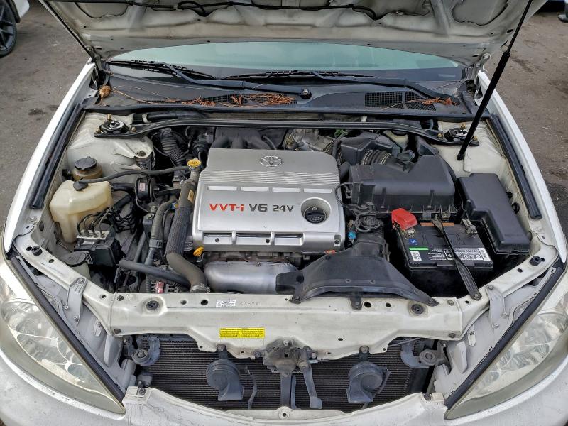 Photo 11 from auction – 2004 TOYOTA CAMRY LE with VIN 4T1BF30KX4U081268