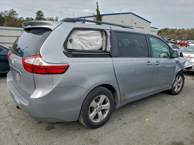Photo 3 from auction – 2015 TOYOTA SIENNA LE with VIN 5TDKK3DC3FS659379