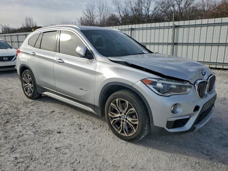 Photo 4 from auction – 2017 BMW X1 XDRIVE2 with VIN WBXHT3Z34H4A54324