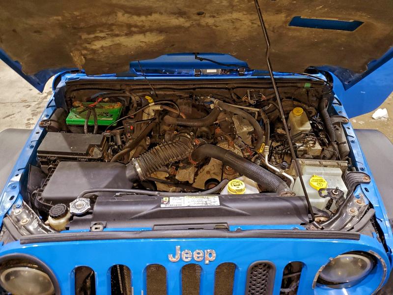 Photo 12 from auction – 2011 JEEP WRANGLER U with VIN 1J4BA5H1XBL558904