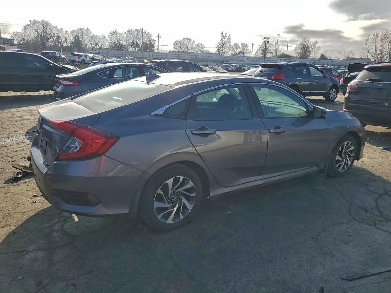 Photo 3 from auction – 2017 HONDA CIVIC EX with VIN 19XFC2F7XHE028280