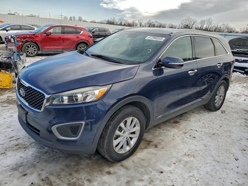 KIA SORENTO LX 2016 with VIN 5XYPGDA30GG169823 - Photo from auction