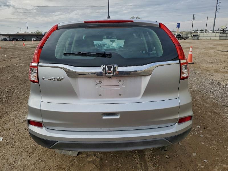 Photo 6 from auction – 2016 HONDA CR-V LX with VIN 3CZRM3H34GG701216