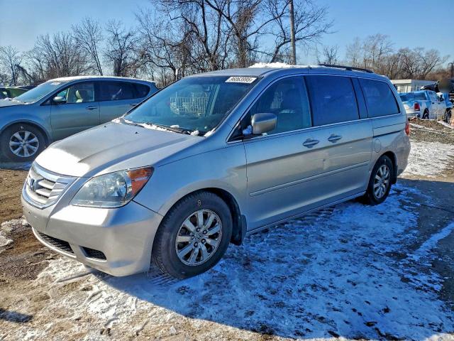 HONDA ODYSSEY 2010 with VIN 5FNRL3H50AB089877 - Photo from auction