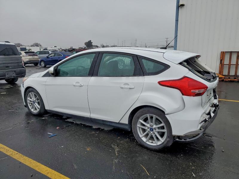 Photo 2 from auction – 2015 FORD FOCUS SE with VIN 1FADP3K25FL342232