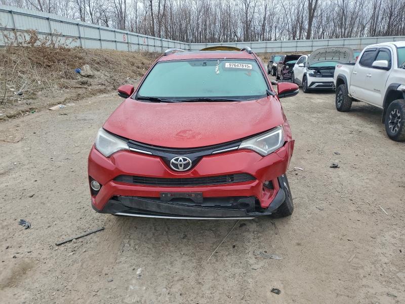 Photo 5 from auction – 2016 TOYOTA RAV4 XLE with VIN JTMRFREV8GJ088203