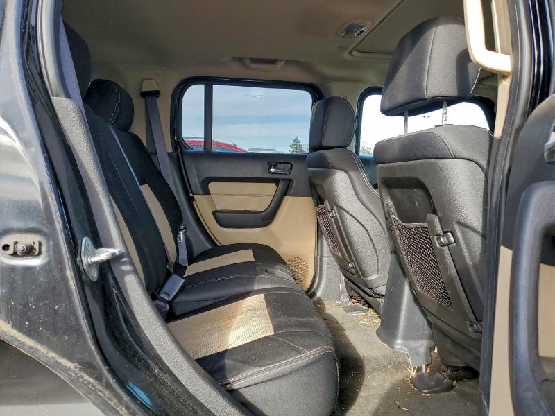 Photo 11 from auction – 2006 HUMMER H3 with VIN 5GTDN136168294309