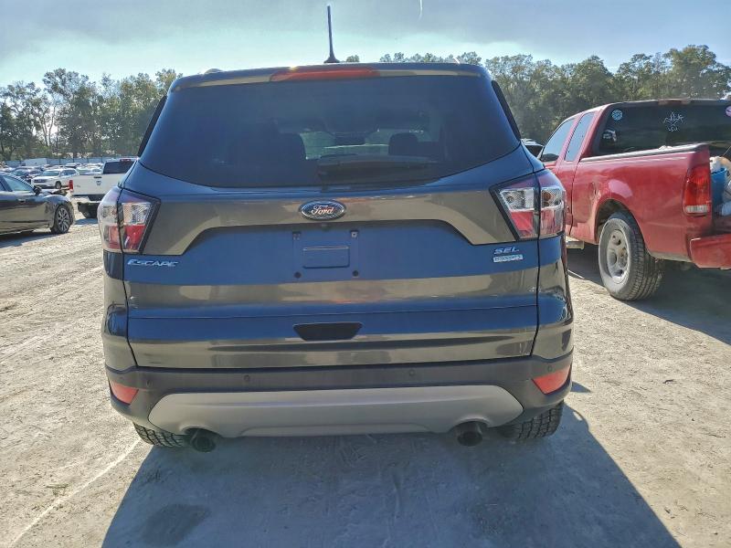 Photo 6 from auction – 2018 FORD ESCAPE SEL with VIN 1FMCU0HDXJUA24191