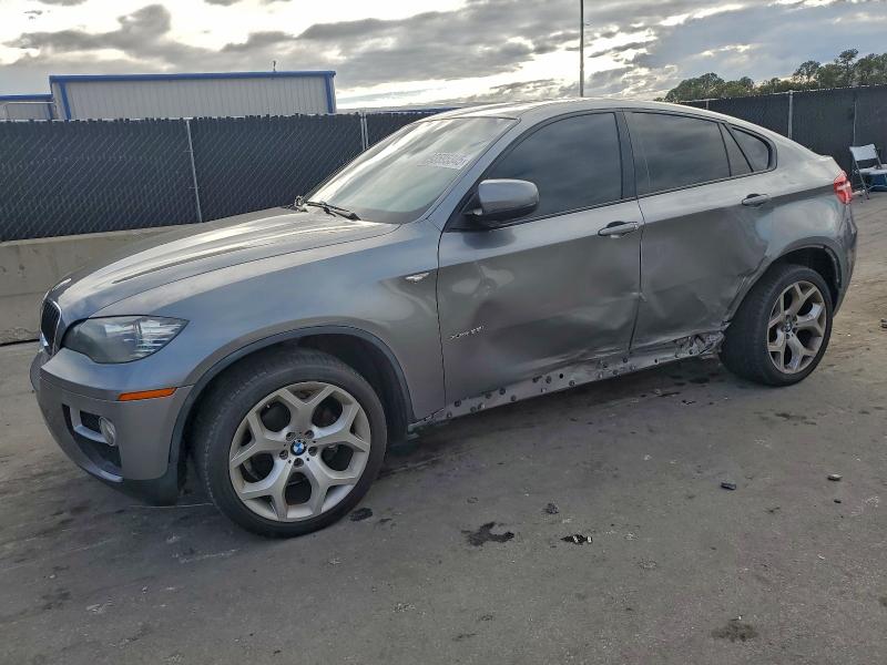 BMW X6 XDRIVE3 2014 with VIN 5UXFG2C55E0H11212 - Photo from auction