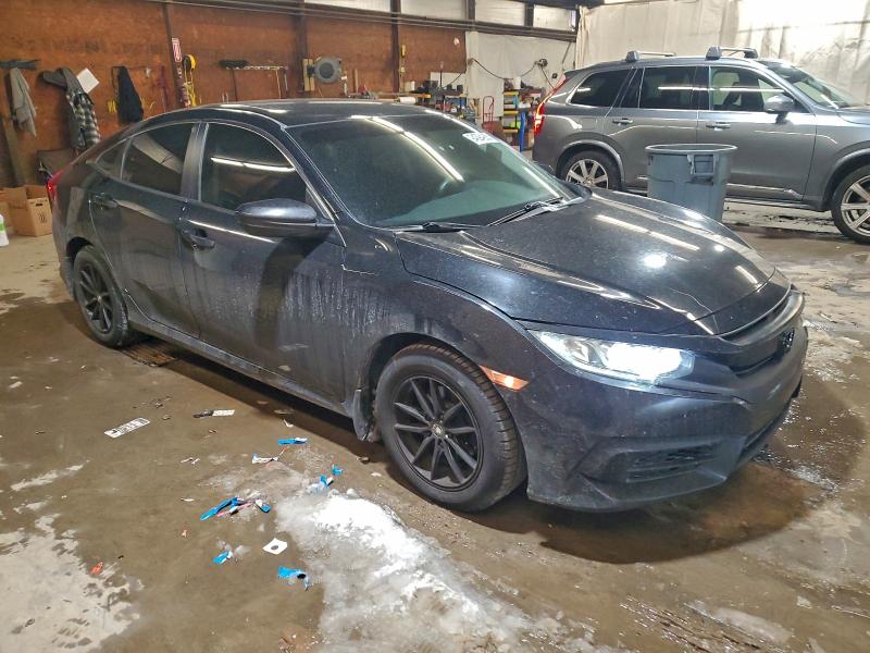 Photo 4 from auction – 2016 HONDA CIVIC LX with VIN 2HGFC2F59GH518101