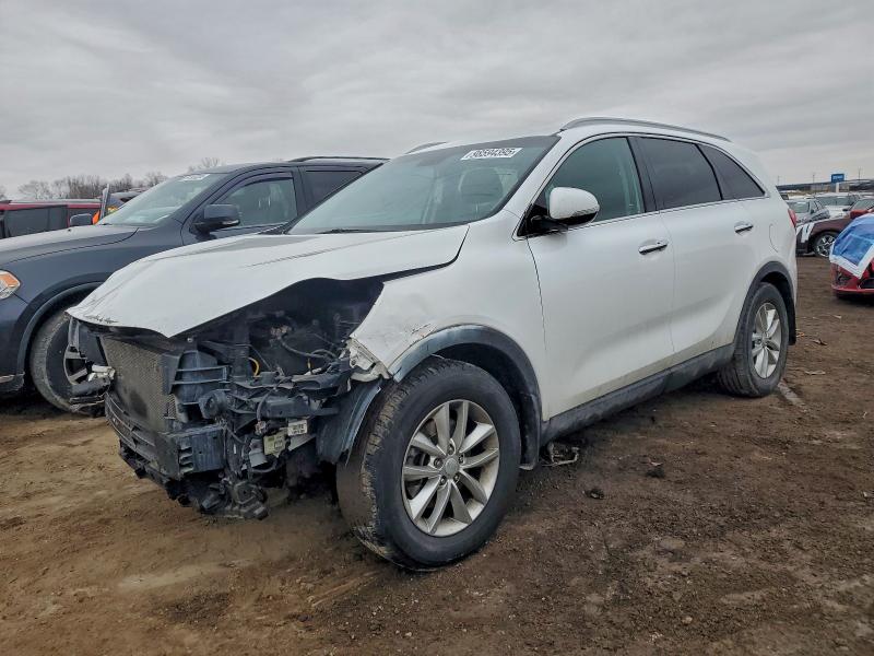 KIA SORENTO LX 2016 with VIN 5XYPG4A58GG006192 - Photo from auction