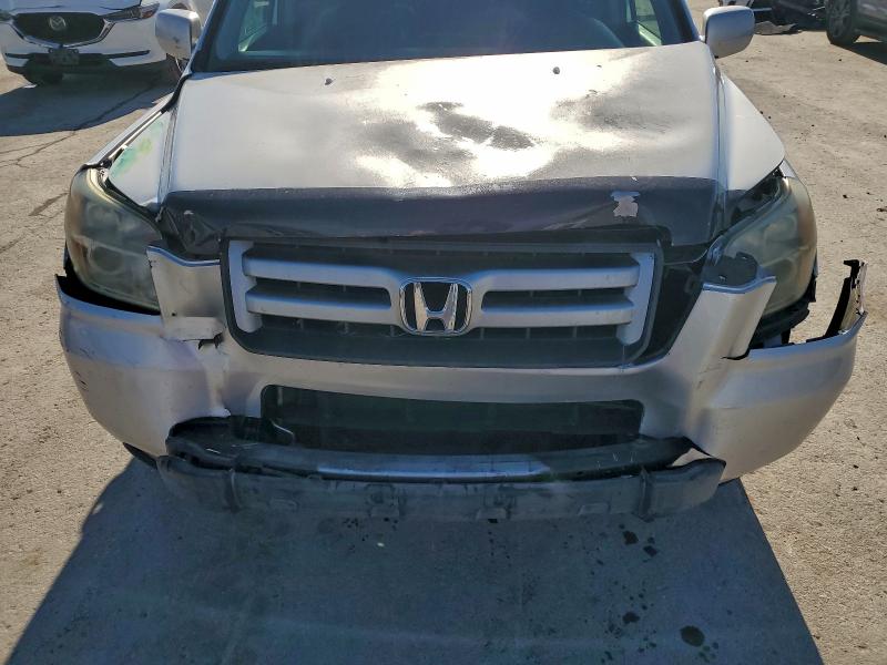 Photo 12 from auction – 2006 HONDA PILOT EX with VIN 5FNYF28556B031879