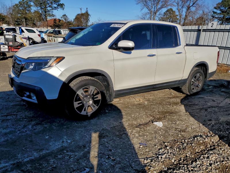 HONDA RIDGELINE 2017 with VIN 5FPYK3F77HB035349 - Photo from auction