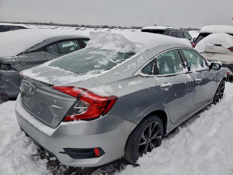Photo 3 from auction – 2021 HONDA CIVIC SPOR with VIN 19XFC2F83ME001991