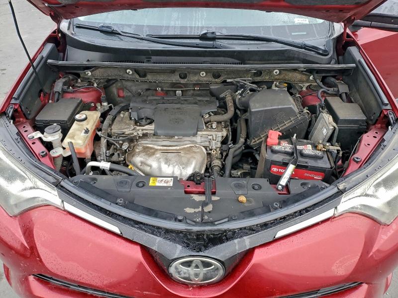 Photo 12 from auction – 2018 TOYOTA RAV4 LE with VIN JTMZFREV7JD112691