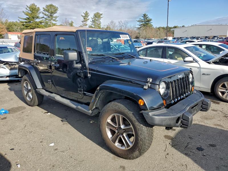 Photo 4 from auction – 2011 JEEP WRANGLER U with VIN 1J4BA3H10BL621996