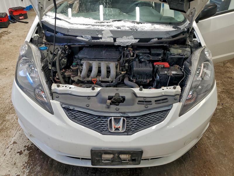 Photo 11 from auction – 2009 HONDA FIT with VIN JHMGE88289S069863
