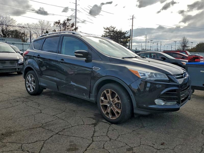 Photo 4 from auction – 2015 FORD ESCAPE TIT with VIN 1FMCU9J98FUB59266