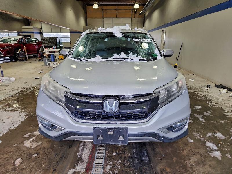 Photo 5 from auction – 2016 HONDA CR-V with VIN 5J6RM3H96GL004900