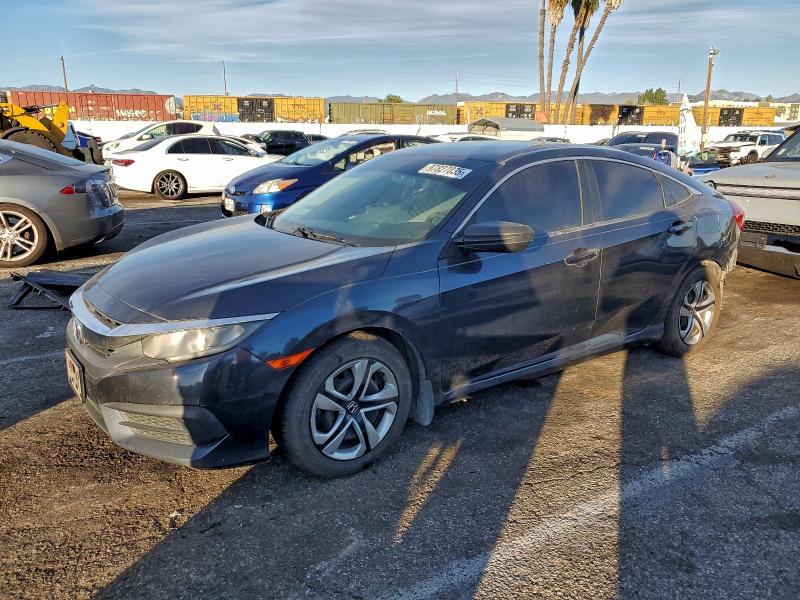 HONDA CIVIC LX 2018 with VIN 19XFC2F52JE014880 - Photo from auction
