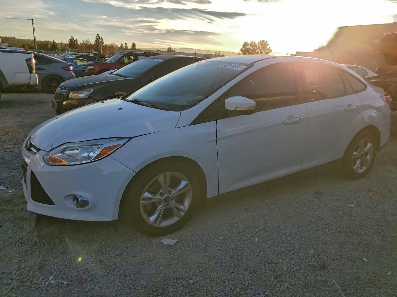 FORD FOCUS SE 2014 with VIN 1FADP3F23EL219179 - Photo from auction
