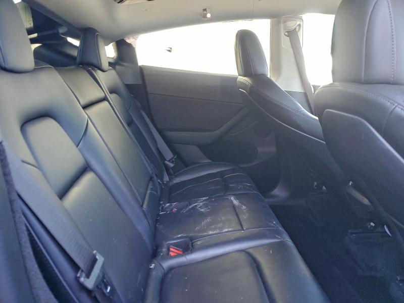 Photo 11 from auction – 2023 TESLA MODEL Y with VIN 7SAYGDEE1PF603211