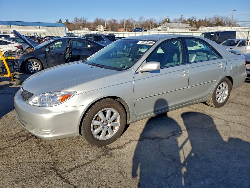 TOYOTA CAMRY LE 2002 with VIN 4T1BF30K82U507262 - Photo from auction