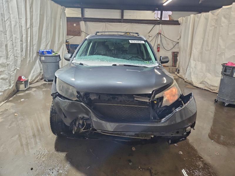 Photo 5 from auction – 2013 HONDA CR-V EXL with VIN 2HKRM4H79DH668747