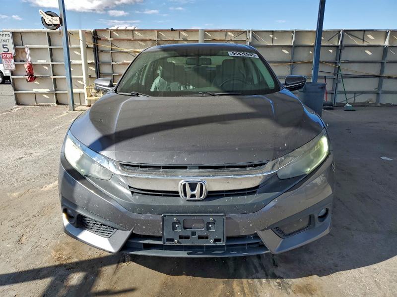 Photo 5 from auction – 2016 HONDA CIVIC TOUR with VIN 19XFC1F9XGE019234