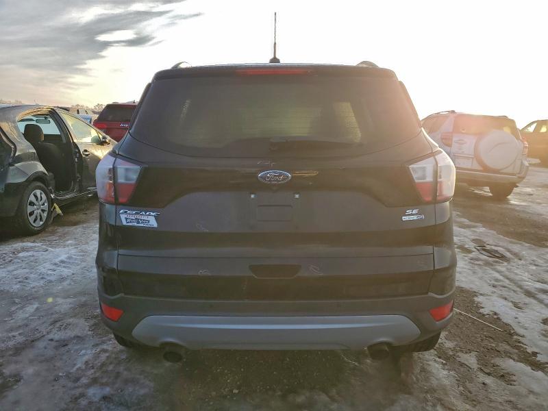 Photo 6 from auction – 2017 FORD ESCAPE SE with VIN 1FMCU9GD2HUD65844