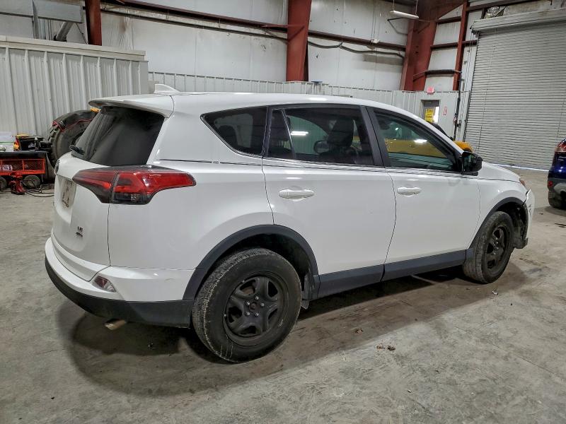 Photo 3 from auction – 2018 TOYOTA RAV4 LE with VIN 2T3BFREV5JW752855