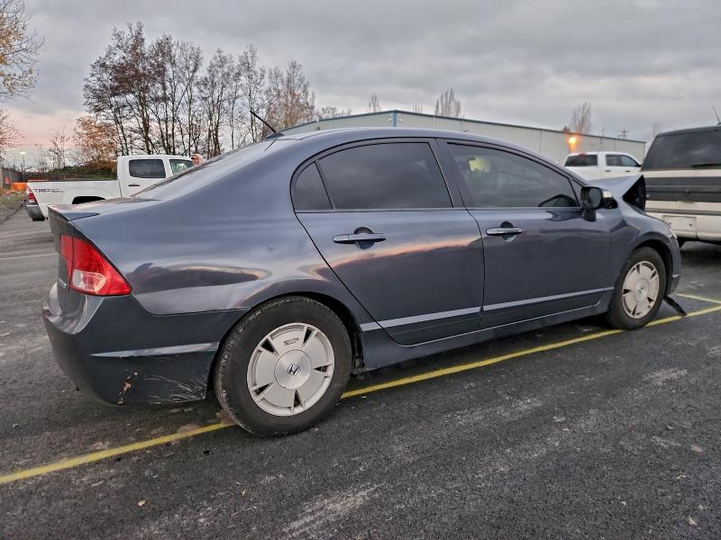 Photo 3 from auction – 2008 HONDA CIVIC HYBR with VIN JHMFA36218S009483