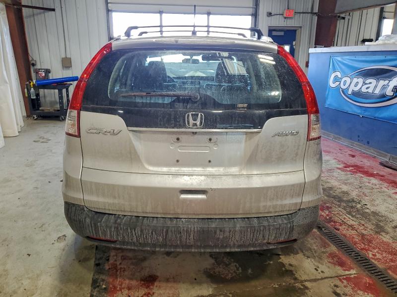 Photo 6 from auction – 2014 HONDA CR-V LX with VIN 2HKRM4H32EH653098