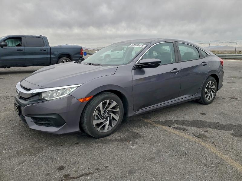 HONDA CIVIC EX 2016 with VIN 2HGFC2F72GH547621 - Photo from auction