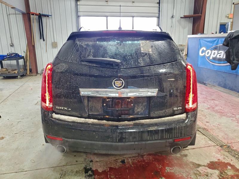 Photo 6 from auction – 2014 CADILLAC SRX LUXURY with VIN 3GYFNEE34ES522331