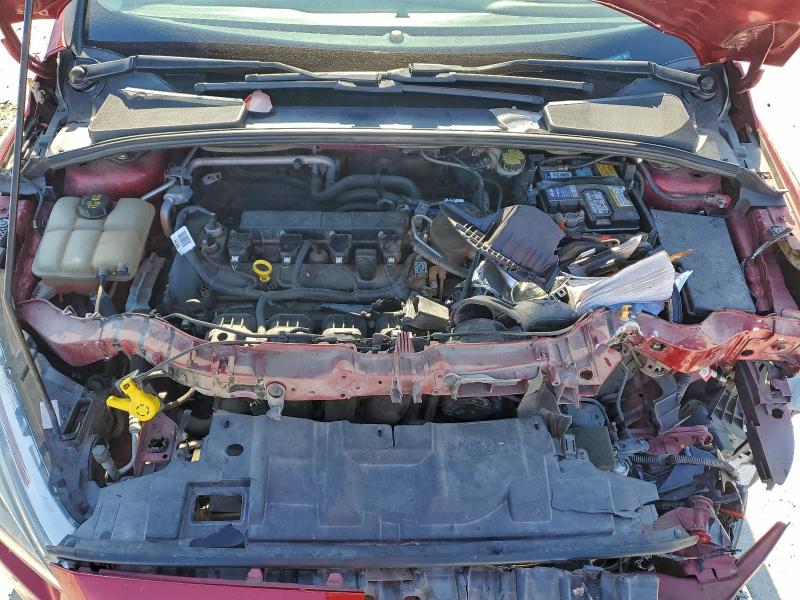Photo 11 from auction – 2015 FORD FOCUS TITA with VIN 1FADP3J28FL240778