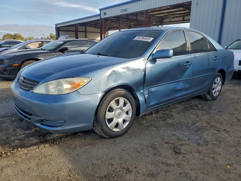 TOYOTA CAMRY LE 2003 with VIN 4T1BE32KX3U674448 - Photo from auction