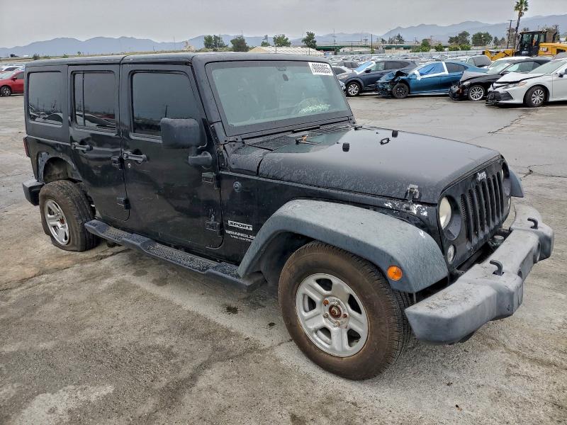 Photo 4 from auction – 2014 JEEP WRANGLER U with VIN 1C4BJWDG6EL104109
