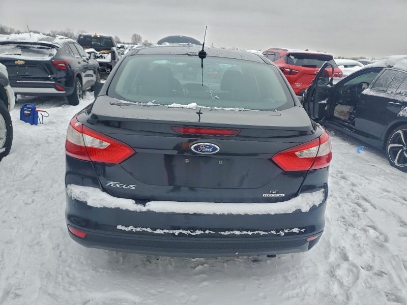 Photo 6 from auction – 2013 FORD FOCUS SE with VIN 1FADP3F29DL312318