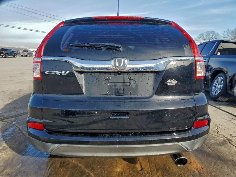 Photo 6 from auction – 2016 HONDA CR-V LX with VIN 2HKRM3H33GH562936