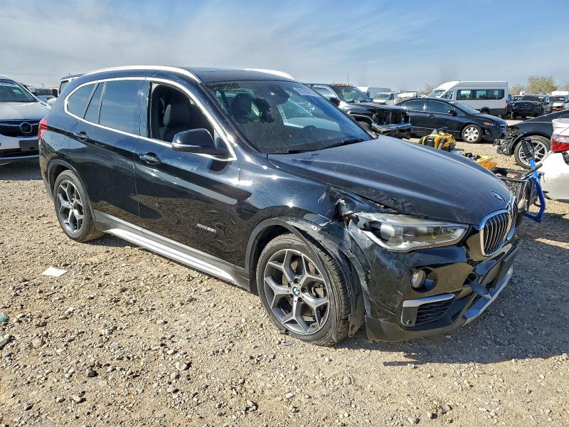 Photo 4 from auction – 2016 BMW X1 XDRIVE2 with VIN WBXHT3C30GP881823