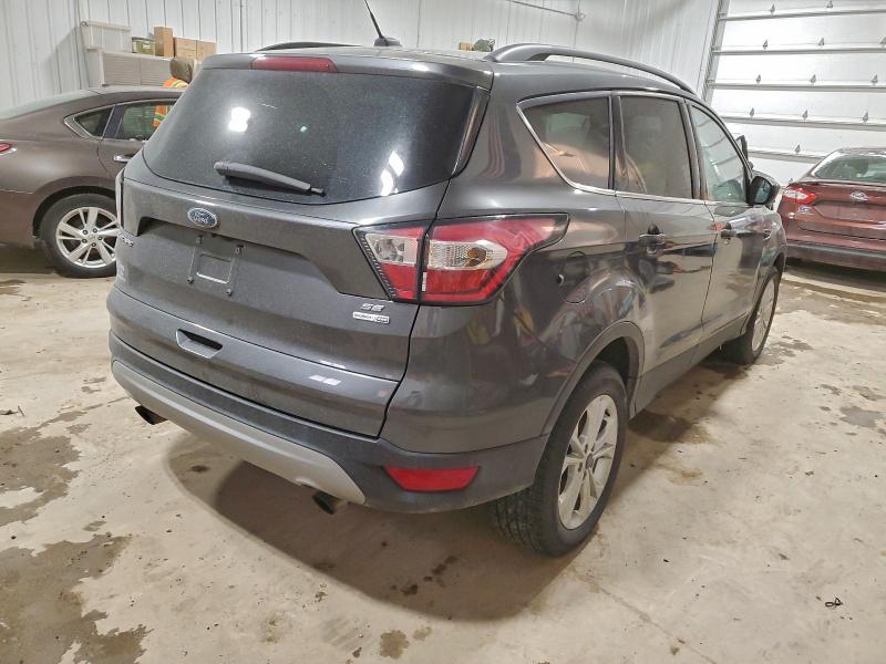Photo 3 from auction – 2018 FORD ESCAPE SE with VIN 1FMCU9GD9JUC19995