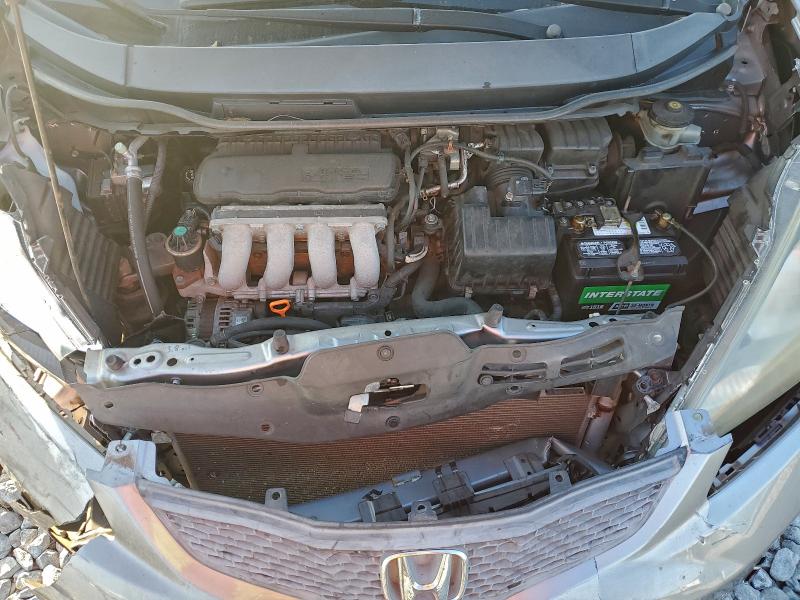 Photo 11 from auction – 2009 HONDA FIT with VIN JHMGE88249S006582